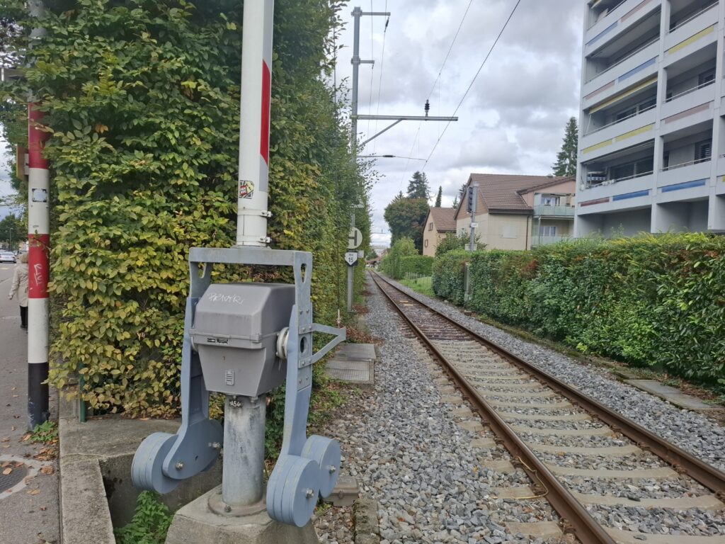 “Waiting for the train at a station”