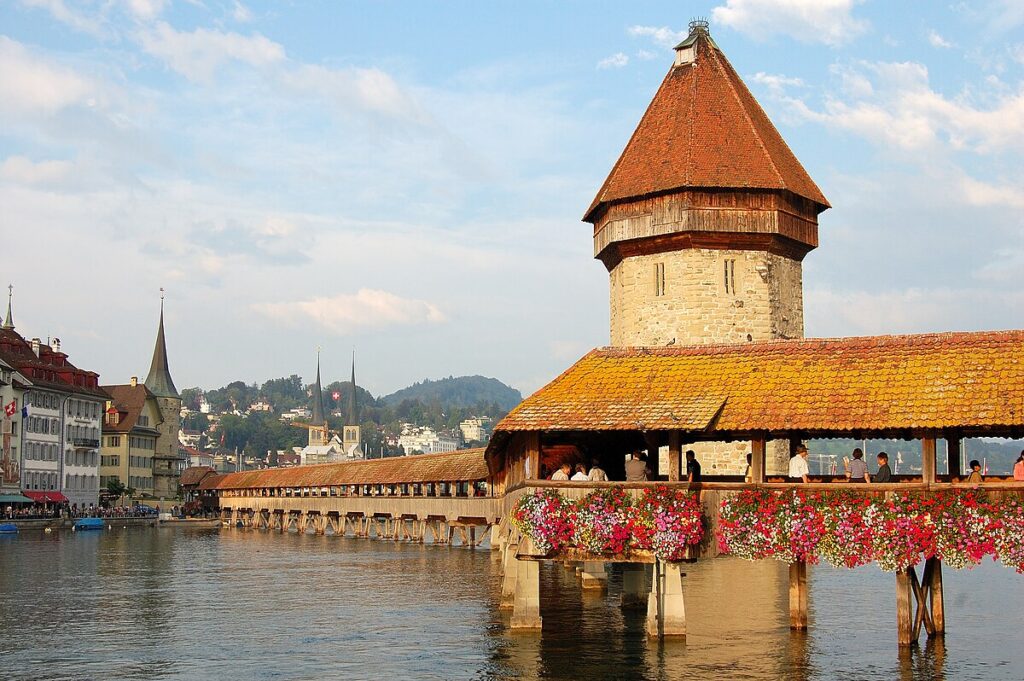 Chapel Bridge and water tower in Lucerne with Lake Lucerne in the background