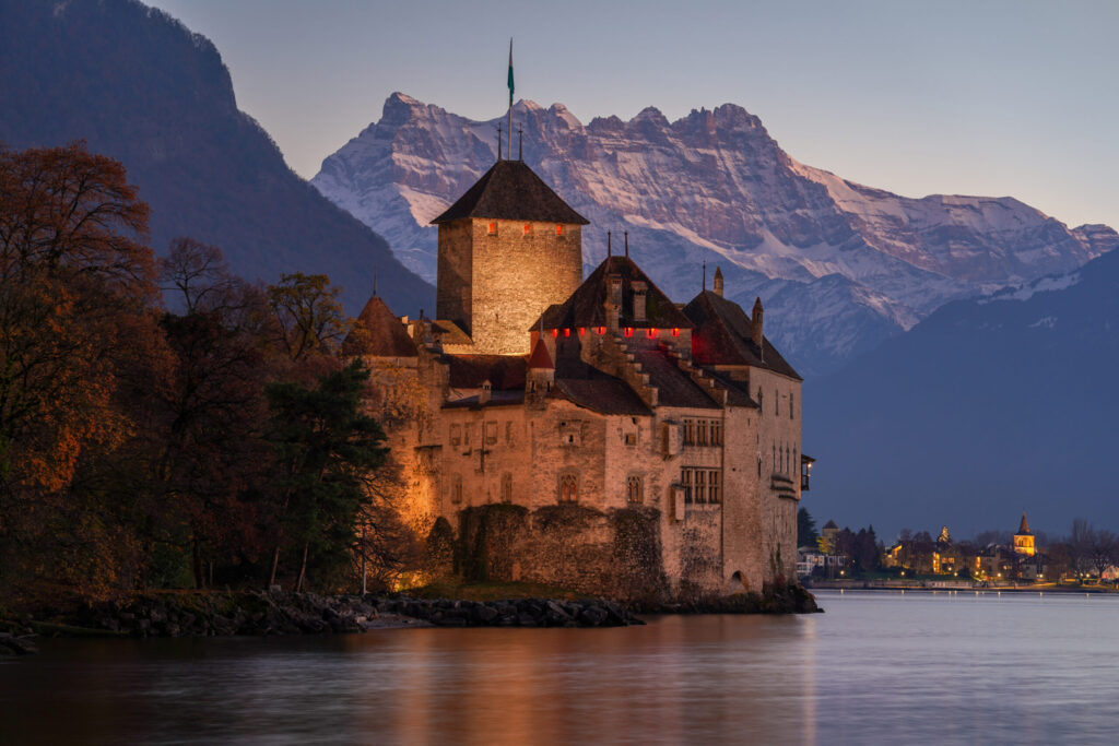 “Château de Chillon medieval stone castle by Lake Geneva, Switzerland — historic landmark and tourist site.”