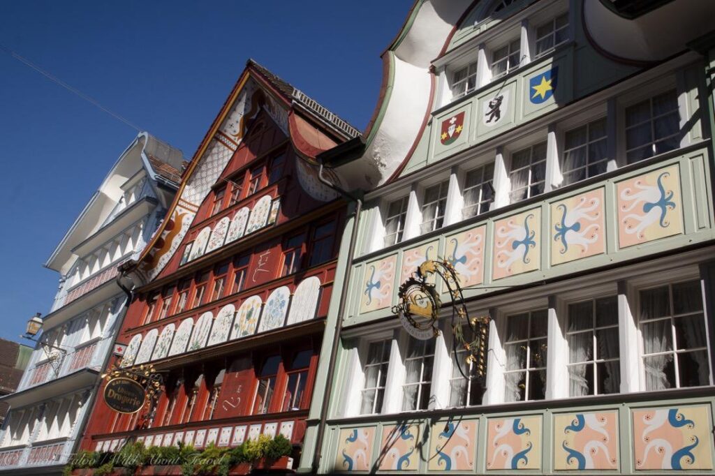 “Colorful traditional houses in the village of Appenzell, Switzerland.”