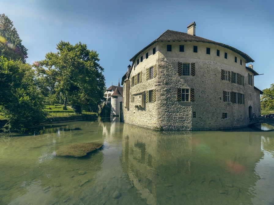 Historic Hallwyl Castle on Lake Hallwil surrounded by calm water, Aargau, Switzerland.2