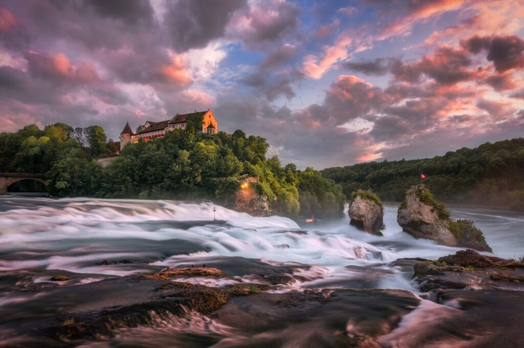 Mighty Rhine Falls roaring over rocks near Schaffhausen, Switzerland.22