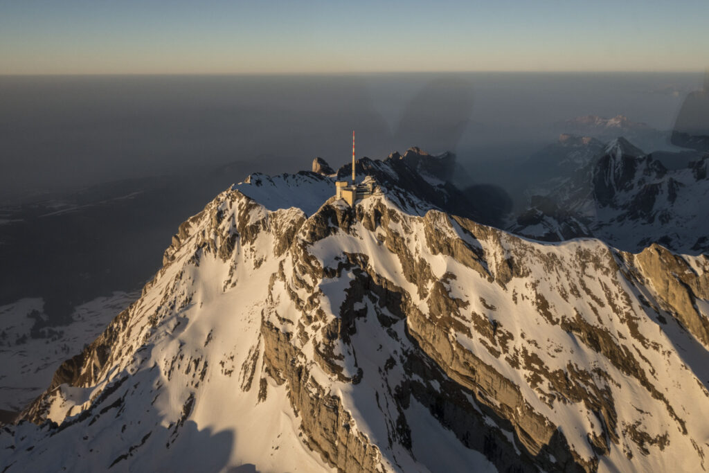 “Panoramic view of the Alpstein mountains with Säntis Peak in Appenzell region.”
