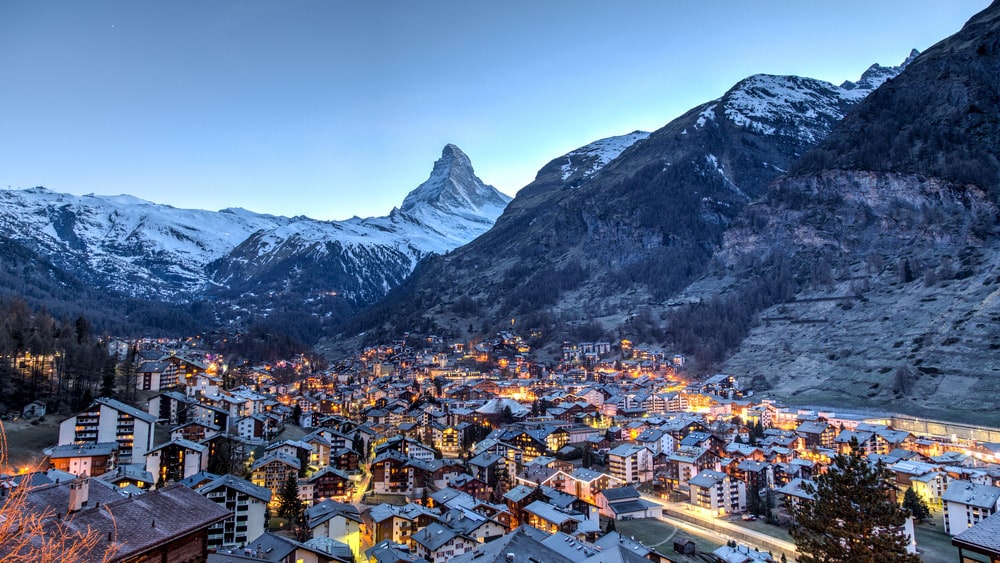 Snow‑capped Matterhorn peak rising above alpine meadows at dawn, Valais, Switzerland.3