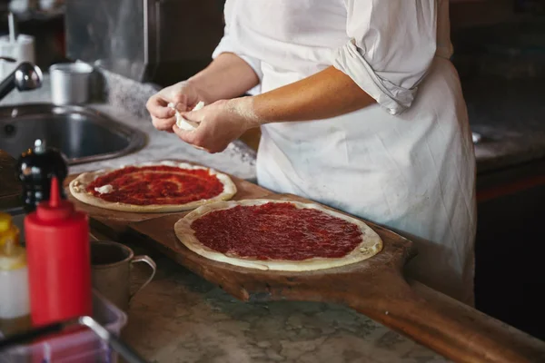“Preparing my pizzas”